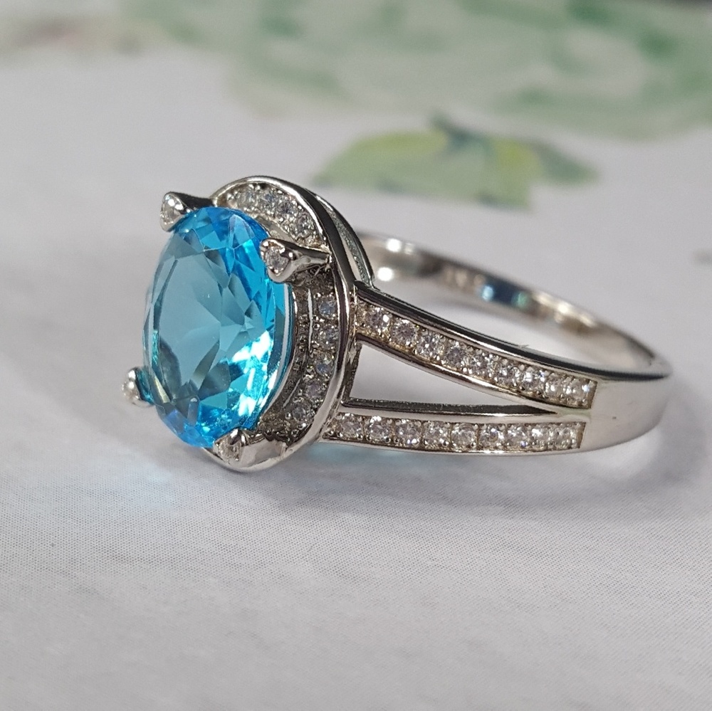 Simulated Blue Topaz with White Cubic Zirconia - Picture 3 of 8